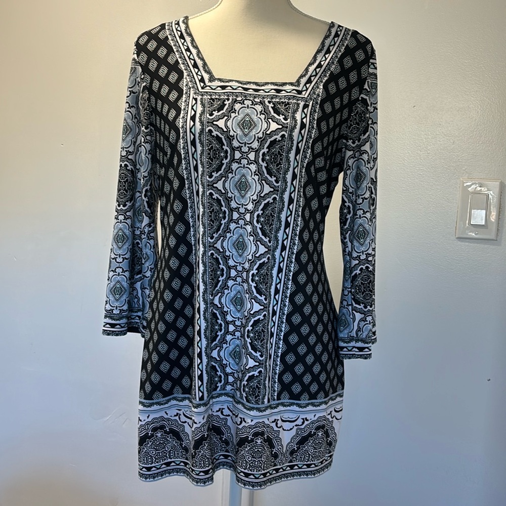 Coco Bianco. Size medium. Black, white, and blue quarter sleeve